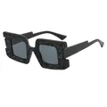Oversized square black sunglasses featuring unique lava texture and dark lenses - Black Frame Grey Lens