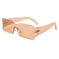 Moderne oversized randloze zonnebril met oranje verloopglazen en geometrische snit - Licht Thee Frame Licht Thee Lenzen