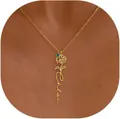 Close-up of personalized gold Chloe flower name necklace with green gemstone on model - Chloe Green Gem Daisy Style (x681) / Gold