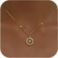 Elegante collana dorata con ciondolo a bussola per donna con zirconi scintillanti - Oro