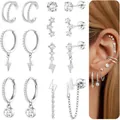 Gros plan d'un ensemble de 12 boucles d'oreilles argentées avec étoiles et zircons - Combinaison de Chaîne d'Étoile (e2357) / Ensemble de 7 Paires / Argent