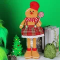 Gingerbread man plush in red checkered skirt holding lollipop for Christmas decor - Telescopic Female Style