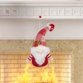 Hanging red and white knitted Christmas gnome ornament with mesh hat and berry detail - Gnome Style