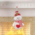 Knitted snowman plush ornament with red heart and striped scarf for Christmas decor - Snowman Style