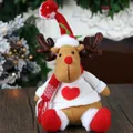 Renna di Natale in peluche con maglione lavorato a maglia e cuore rosso decorativo - Renna Seduta