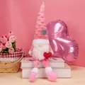 Pink and white Valentine Gnome plush with long white beard and holding a red heart - Pink