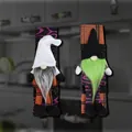 Set of two Halloween gnome refrigerator handle covers in orange and purple patterns - Gnome Doll Handle Covers