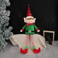 Christmas elf plush doll with red sequins and green velvet seated on burlap mat - Green