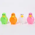 Row of four colorful penguin-shaped pencil sharpeners in green, orange, white and pink - Random Assorted Colors (Penguin Style)