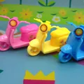 Cute cartoon motorcycle pencil sharpener set in pink, yellow, and blue plastic - Random Mixed Colors