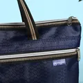 Close-up of diamond lattice texture on navy blue waterproof Oxford cloth briefcase - Diamond Texture (9912)