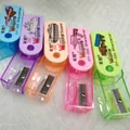 Manual pencil sharpeners with military graphics in blue, purple, pink, orange and green - Multicolor Random