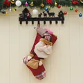 Großer Weihnachtsstrumpf als Geschenktüte mit 3D Weihnachtsmann und Karomuster-Detail - Weihnachtsmann