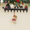 Christmas wall mounted black metal hook rack with reindeer and forest silhouette - Snowman
