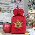 Red Christmas felt gift bag featuring 3D reindeer design with green holly and berries - Elk Style / Red