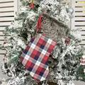 British style plaid Christmas stocking with faux fur trim hanging on snowy tree branch - Dark Plaid Faux Fur Stocking (Red Blue White Plaid)