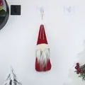 Red Christmas gnome ornament with white beard and felt hat hanging on tree - Square Style / Red