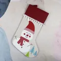 Christmas stocking with snowman embroidery, red cuff with pompoms, and hanging loop ornament - Snowman