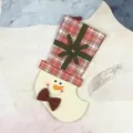 Christmas stocking gift bag with snowman face and red white plaid patterns for tree decor - Snowman