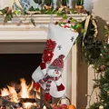 White Christmas stocking with a 3D snowman, striped scarf, and gift box detail - Snowman