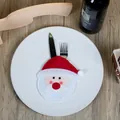 Santa Claus cutlery holder made of red felt for Christmas table decoration settings - Santa Claus
