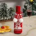 Knitted Christmas wine bottle cover with snowman patterns and festive red bow decoration - Snowman Style / Red