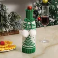 Knitted snowman wine bottle cover with green and white snowflake patterns for Christmas decor - Christmas Tree Style / Green