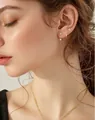 Détail de l'ensemble boucles d'oreilles étoile et papillon plaqué or avec zircons brillants - Style Empilable Position Oreille Strass Feuille Barre (e611) / 14k / Ensemble trois pièces / Or