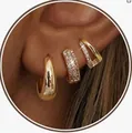 Detailed close-up of gold-plated brass ear cuff set with inlaid zircon star and butterfly - Wide Face Micro Pave V-Shaped Fork Style (e2000) / 14k / Three-Piece Set / Gold