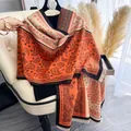 Scialle arancione con motivo paisley, effetto cashmere con nappe e stile bohémien - 185cm / Arancione