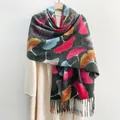 Green scarf with maple leaf print and tassels styled on a white wool coat - Gray / Over 175cm