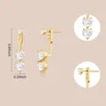Detailed view of triple heart stud earrings with cubic zirconia in 18K gold plating - Heart Triple Stones (e1025) / 14k / One Pair / Gold