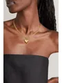 Detail of a gold-plated heart pendant necklace with OT toggle clasp on model's neck - Puffy Heart Pendant Round Link Chain Necklace (x330) / Gold