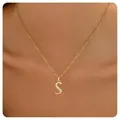 Close-up of a gold-plated necklace featuring a zircon-inlaid letter S pendant on a model - Letter S / 14k