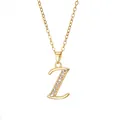 Macro detail of gold plated letter Z pendant necklace with sparkling zircon stones - Letter Z / 14k