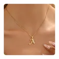 Gold brass necklace with letter A pendant and small clear zircons on a delicate chain - Letter A / 14k