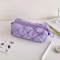 Detail of light purple quilted pencil case with large gear zipper and ring puller - Purple