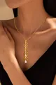 Détail du collier doré en laiton multicouche avec pendentifs feuilles et zircon goutte - Collier pendentif strass épi de blé (x436) / 14k / 1 Pièce/Lot