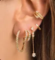 Close-up of layered gold tassel earrings with zircon stars and sparkling hoop ear cuffs - Star Chain Hoop Earring Set (e910)