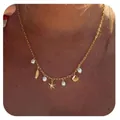 Golden summer beach necklace with starfish, seashell, turtle charms and pearls on a model - Starfish Shell Feather Style(x449) / 14k / Gold