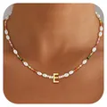 Detail of bohemian pearl necklace featuring colorful beads and a golden letter E pendant - Letter E