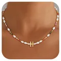 Detail of bohemian beaded necklace featuring baroque pearls and gold letter H pendant - Letter H