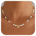 Close-up of bohemian beaded necklace with pearls and gold plated letter J pendant - Letter J
