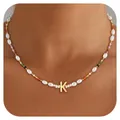 Detail of bohemian pearl necklace featuring colorful beads and a gold letter K pendant - Letter K