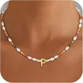 Detail of beaded necklace with irregular pearls and golden letter P on a female model - Letter P