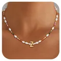 Detail of beaded necklace with Baroque pearls and colorful beads featuring a gold letter Z - Letter Z