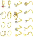 Detailed collection of 18 gold-plated nose studs and rings with sparkling zircon crystals - e1523 - Gold (Set of 18) / 14k