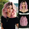 Short wavy Bob wig with ombre pink gradient color and dark roots for a natural look - Peach Pink