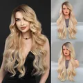 Long wavy champagne blonde gradient lace wig with deep roots for a natural look - 70cm / Orange Gold Root Dye