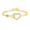 Golden infinity heart bracelet with sparkling cubic zirconia stones and adjustable chain - Heart Bangle - Yellow Gold Tone